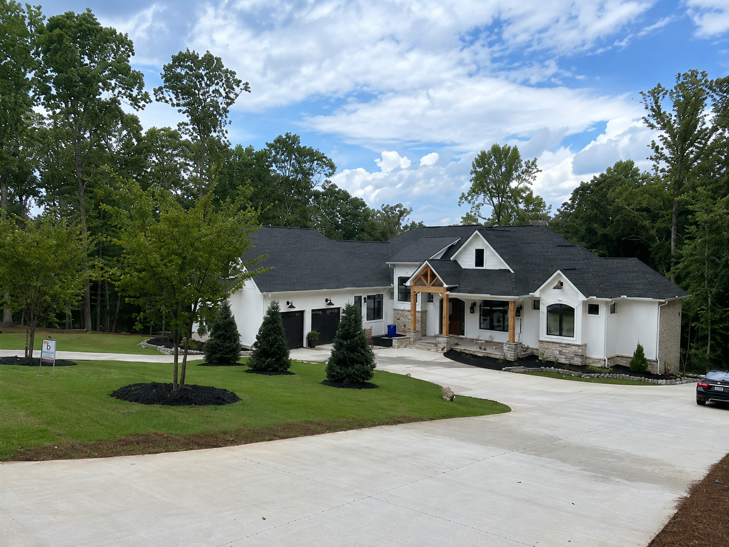 Completed landscape installation with mulch beds and plantings in Anderson County, SC