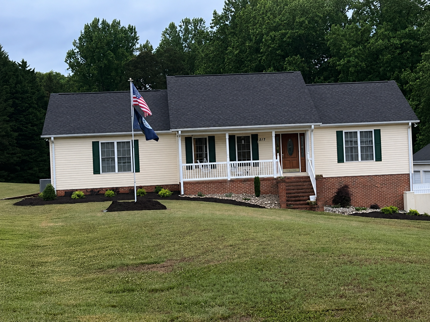 Completed Bannister's Landscaping project with curved beds and lawn